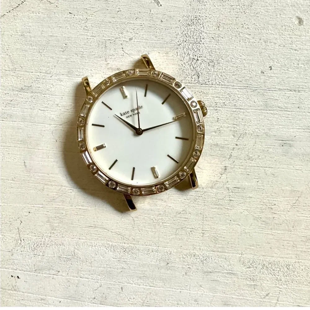 Kate Spade gold tone rhinestone watch face